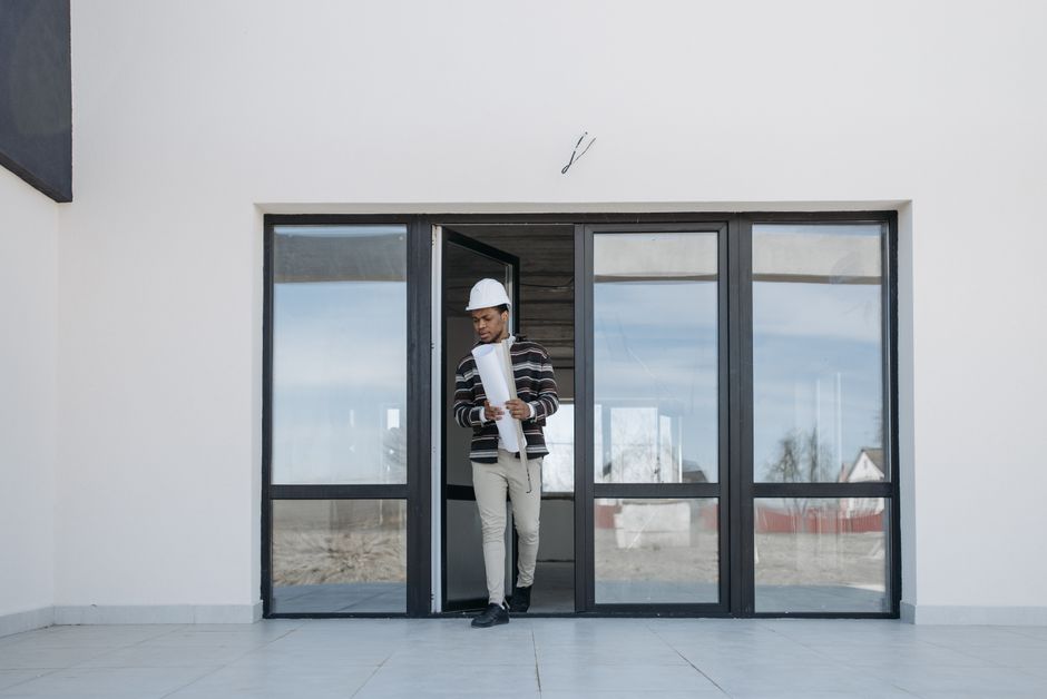 Professional contractor installing a door